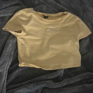 Cropped yellow mushroom Garage baby tee
